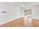 Bedroom with sliding glass doors leading to patio at 6770 Mauna Loa Blvd, Sarasota, FL 34241