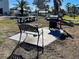 Community grill and seating area at 6800 Placida Rd # 2017, Englewood, FL 34224