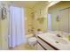 Clean bathroom with a shower/tub combo and vanity at 6800 Placida Rd # 2017, Englewood, FL 34224