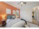 Well-lit bedroom with double doors and built-in closet at 6919 Winners Cir, Lakewood Ranch, FL 34202