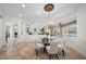 Bright dining area with a glass-top table and seating for four at 6919 Winners Cir, Lakewood Ranch, FL 34202