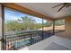 Spacious screened balcony with pool and nature views at 6919 Winners Cir, Lakewood Ranch, FL 34202