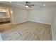 Large bedroom with ensuite bathroom access and wood-look floors at 7 Oakland Hills Pl, Rotonda West, FL 33947