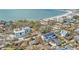 Aerial perspective showcasing home's location near the beach and other homes at 7007 Point Of Rocks Rd, Sarasota, FL 34242