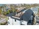 Aerial view of a rooftop deck with seating area, offering city views at 7007 Point Of Rocks Rd, Sarasota, FL 34242