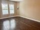 Spacious bedroom with hardwood floors and ample natural light at 715 116Th Ne Ct, Bradenton, FL 34212