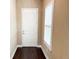 Bright entryway with hardwood floors and white door at 715 116Th Ne Ct, Bradenton, FL 34212