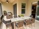 Outdoor patio with seating area and dining table at 715 116Th Ne Ct, Bradenton, FL 34212