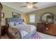 Spacious main bedroom with king-size bed and plenty of light at 7203 41St E Ct, Sarasota, FL 34243