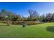 Peaceful pond view with lush greenery at 7203 41St E Ct, Sarasota, FL 34243