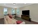 Spacious bonus room featuring hardwood floors and ample natural light at 7315 Bianco Duck Ct, Sarasota, FL 34240