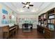 Spacious home office with hardwood floors and abundant natural light at 7315 Bianco Duck Ct, Sarasota, FL 34240