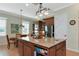 Breakfast nook in kitchen with wood table and chairs at 7315 Bianco Duck Ct, Sarasota, FL 34240