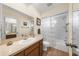 Clean bathroom with a shower/tub combo and vanity at 7460 W Country Club N Dr, Sarasota, FL 34243