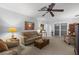 Bright living room features a comfy sofa and neutral color palette at 7460 W Country Club N Dr, Sarasota, FL 34243