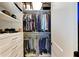 Well-organized walk-in closet with custom shelving at 7555 Tori Way, Lakewood Ranch, FL 34202