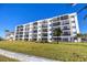 Front view of a three story condo building at 757 Beach Rd # 208, Sarasota, FL 34242