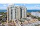 Luxury condo building with pool and parking at 800 N Tamiami Trl # 1502, Sarasota, FL 34236