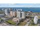 Condo building with a pool and beautiful waterfront views at 800 N Tamiami Trl # 1502, Sarasota, FL 34236