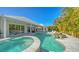 Resort-style pool with spa and outdoor entertaining space at 8005 20Th W Pl, Bradenton, FL 34209