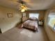 Comfortable bedroom with queen bed and lots of natural light at 808 53Rd E Ave # 76, Bradenton, FL 34203