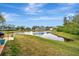 Tranquil backyard setting overlooking a pond at 839 Manchester Woods Dr # 25, Sun City Center, FL 33573