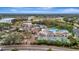 Aerial view of community amenities including pool, tennis, and pickleball courts at 839 Manchester Woods Dr # 25, Sun City Center, FL 33573