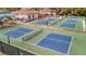 Well maintained pickleball courts in a resort community at 839 Manchester Woods Dr # 25, Sun City Center, FL 33573