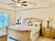 Spacious main bedroom with large bed and ample natural light at 87 Long Meadow Ln, Rotonda West, FL 33947