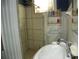 Bathroom with shower stall, sink, and toilet at 9 Plaza E St, Bradenton, FL 34208