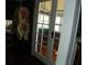 View of French doors opening to a sunroom at 9 Plaza E St, Bradenton, FL 34208