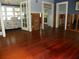 Living room with hardwood floors and exposed walls at 9 Plaza E St, Bradenton, FL 34208