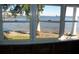 Sunroom with stunning waterfront views, undergoing renovation at 9 Plaza E St, Bradenton, FL 34208