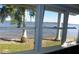 Sunroom with waterfront views and wood flooring, under renovation at 9 Plaza E St, Bradenton, FL 34208