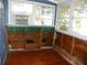 Unfinished sunroom with wood flooring and window views at 9 Plaza E St, Bradenton, FL 34208