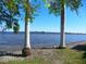 Scenic waterfront view with palm trees and calm water at 9 Plaza E St, Bradenton, FL 34208