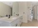 Modern bathroom with double vanity and black fixtures at 9100 Yarberry St, Sarasota, FL 34240