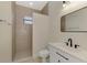 Bathroom with a walk-in shower, toilet and modern vanity at 9100 Yarberry St, Sarasota, FL 34240