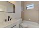 Small bathroom with tub and shower combo at 9100 Yarberry St, Sarasota, FL 34240