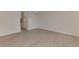 Spacious bedroom with light wood flooring at 9100 Yarberry St, Sarasota, FL 34240