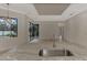 Modern kitchen with granite countertops and stainless steel sink, overlooking backyard at 9100 Yarberry St, Sarasota, FL 34240