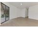 Light-filled bedroom with sliding glass doors opening to a patio at 9100 Yarberry St, Sarasota, FL 34240