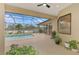 Relaxing screened pool area with lush landscaping at 9100 Yarberry St, Sarasota, FL 34240