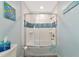 Bathroom with a walk-in shower and updated fixtures at 10428 Marion St, Englewood, FL 34224