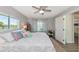 Bedroom with king-size bed and calming decor at 10428 Marion St, Englewood, FL 34224