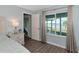 Bedroom with water views and access to a private patio at 10428 Marion St, Englewood, FL 34224