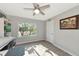 Sunlit home office with window and hardwood floors at 10428 Marion St, Englewood, FL 34224