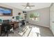 Bright home office features built-in shelving and wood desk at 10428 Marion St, Englewood, FL 34224