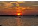 Bright sunset over calm waters at 10428 Marion St, Englewood, FL 34224