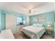 Light and airy bedroom with a double bed and light blue walls at 1108 43Rd Avenue E Dr, Ellenton, FL 34222